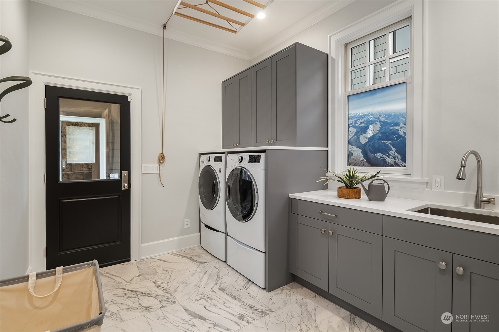 7270 North Mercer Way Mercer Island, WA 98040 - Photo 24 of 40 a utility room with cabinets