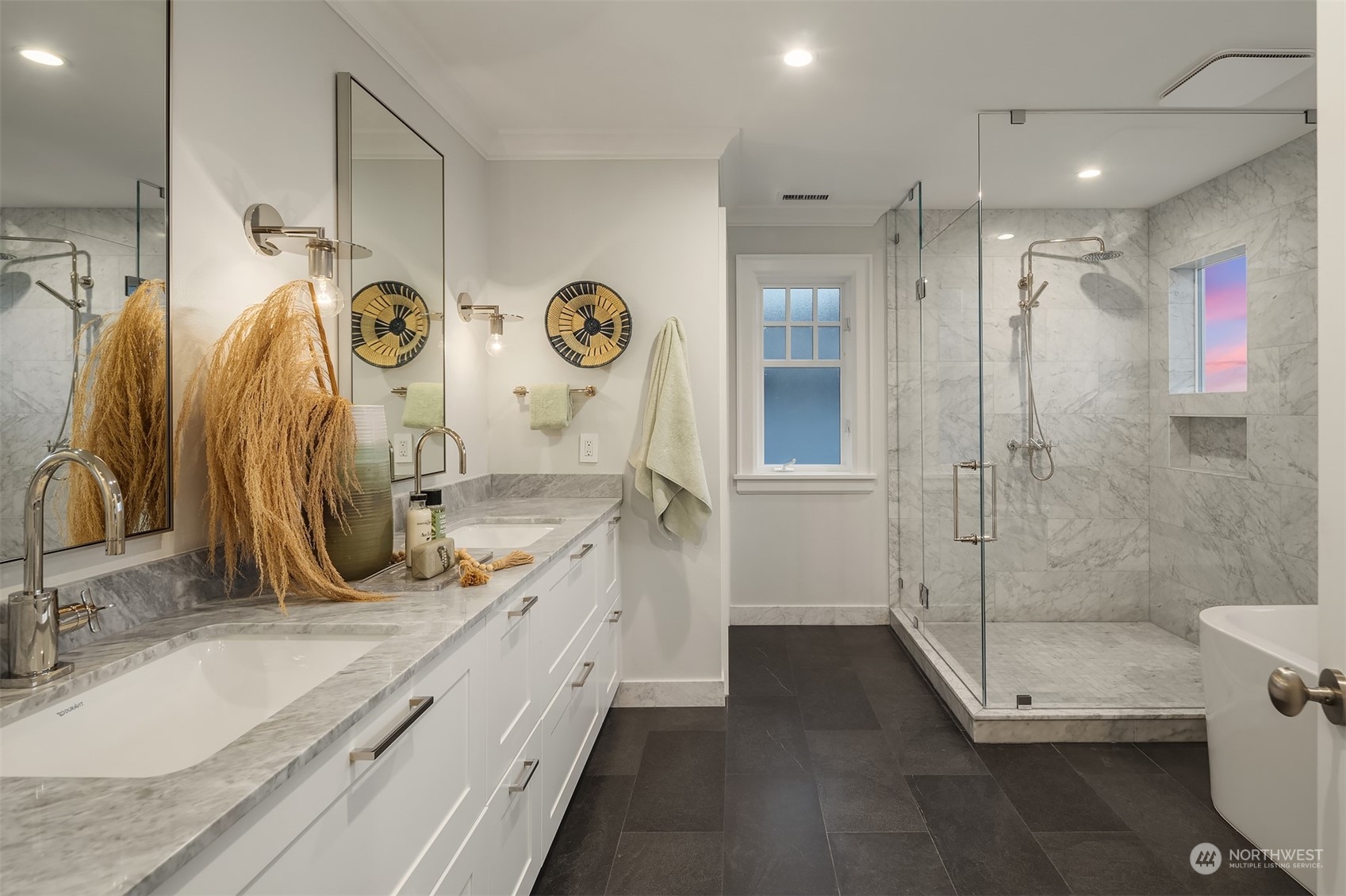7270 North Mercer Way Mercer Island, WA 98040 - Photo 26 of 40 a bathroom with double vanity and a shower