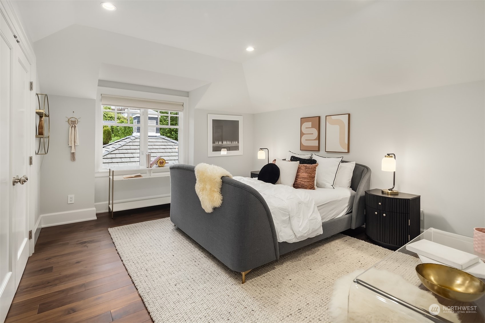7270 North Mercer Way Mercer Island, WA 98040 - Photo 30 of 40 a bed room with a bed and a large window