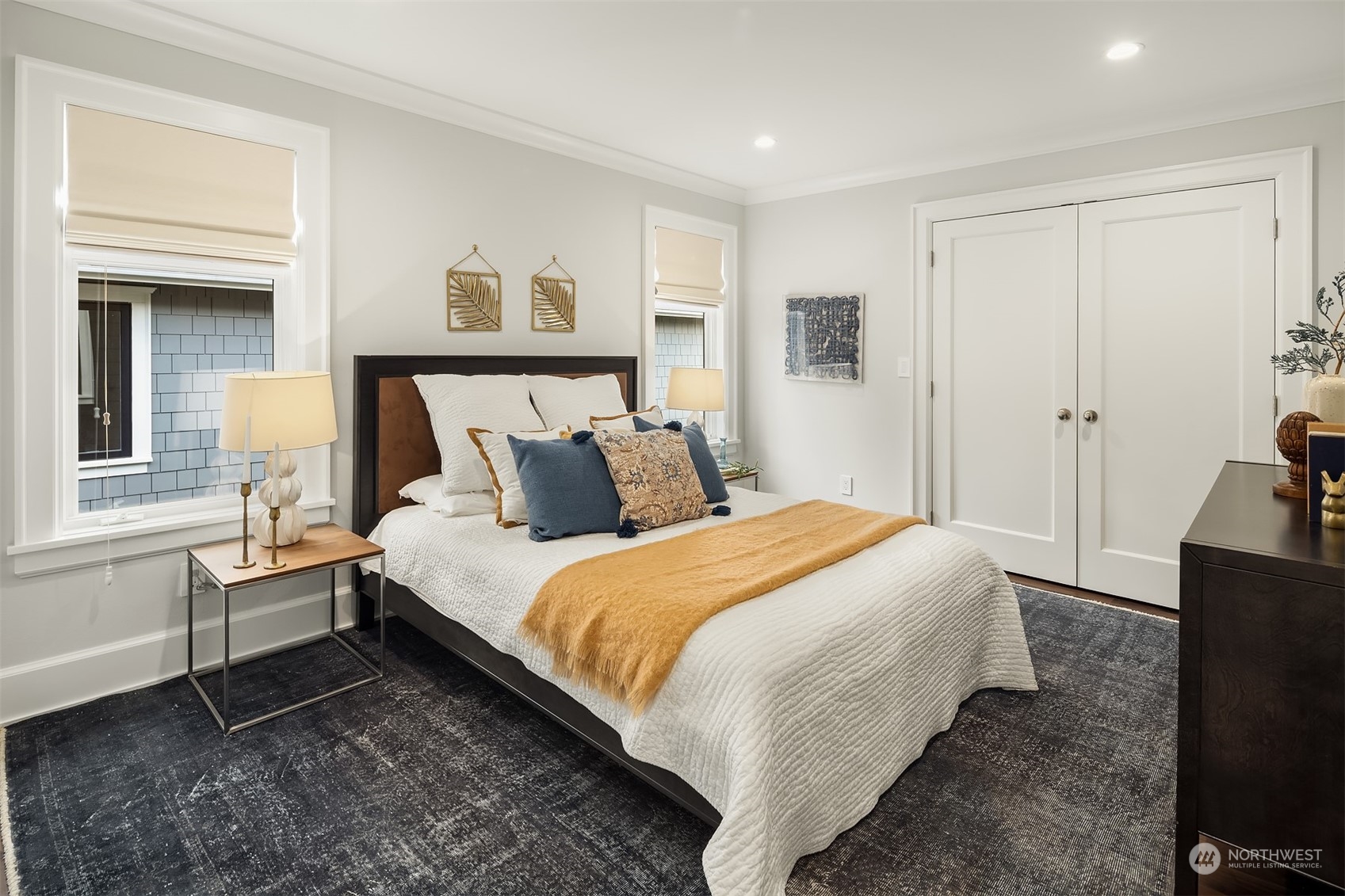 7270 North Mercer Way Mercer Island, WA 98040 - Photo 31 of 40 a bedroom with bed and a window