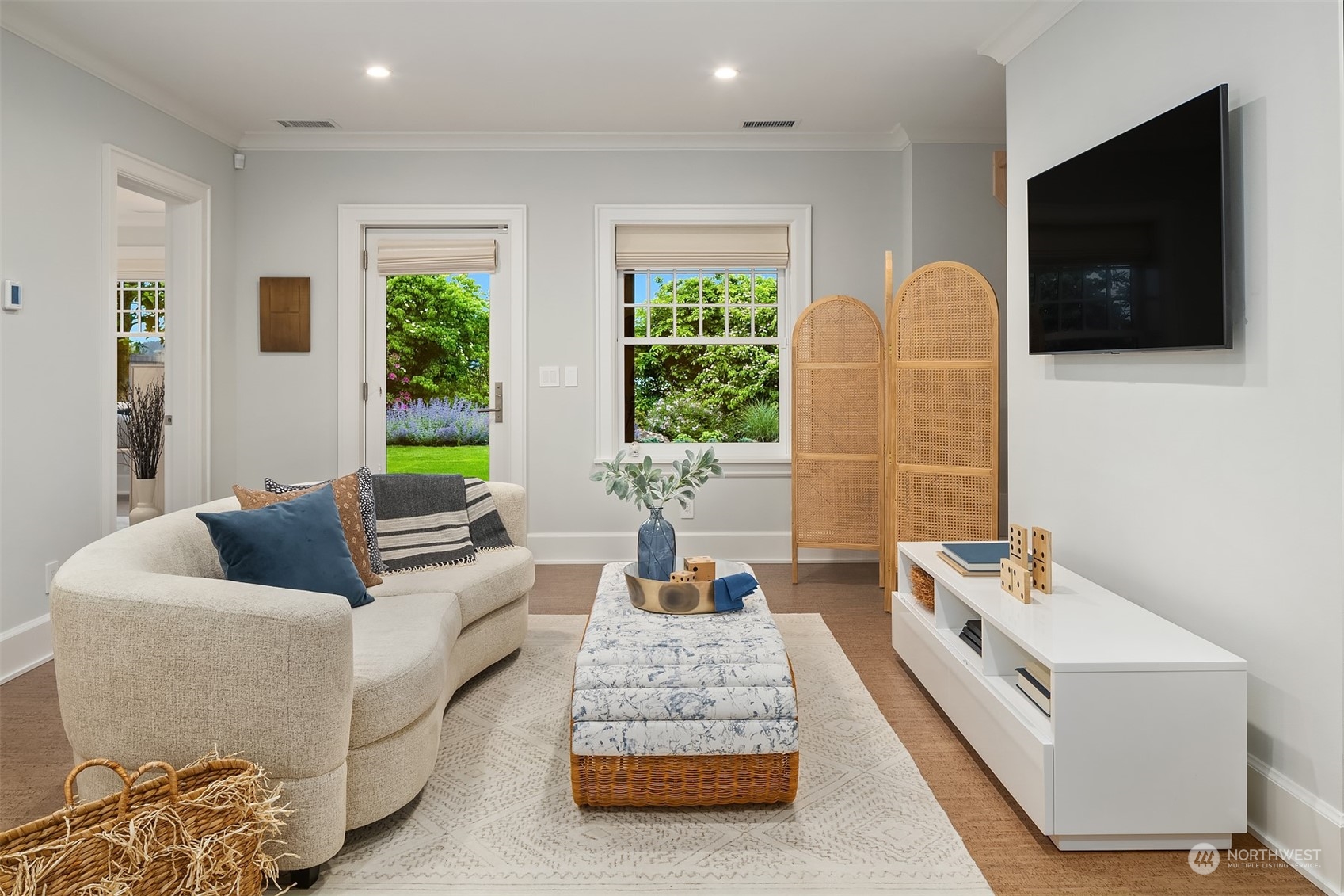 7270 North Mercer Way Mercer Island, WA 98040 - Photo 34 of 40 a living room with furniture and a flat screen tv