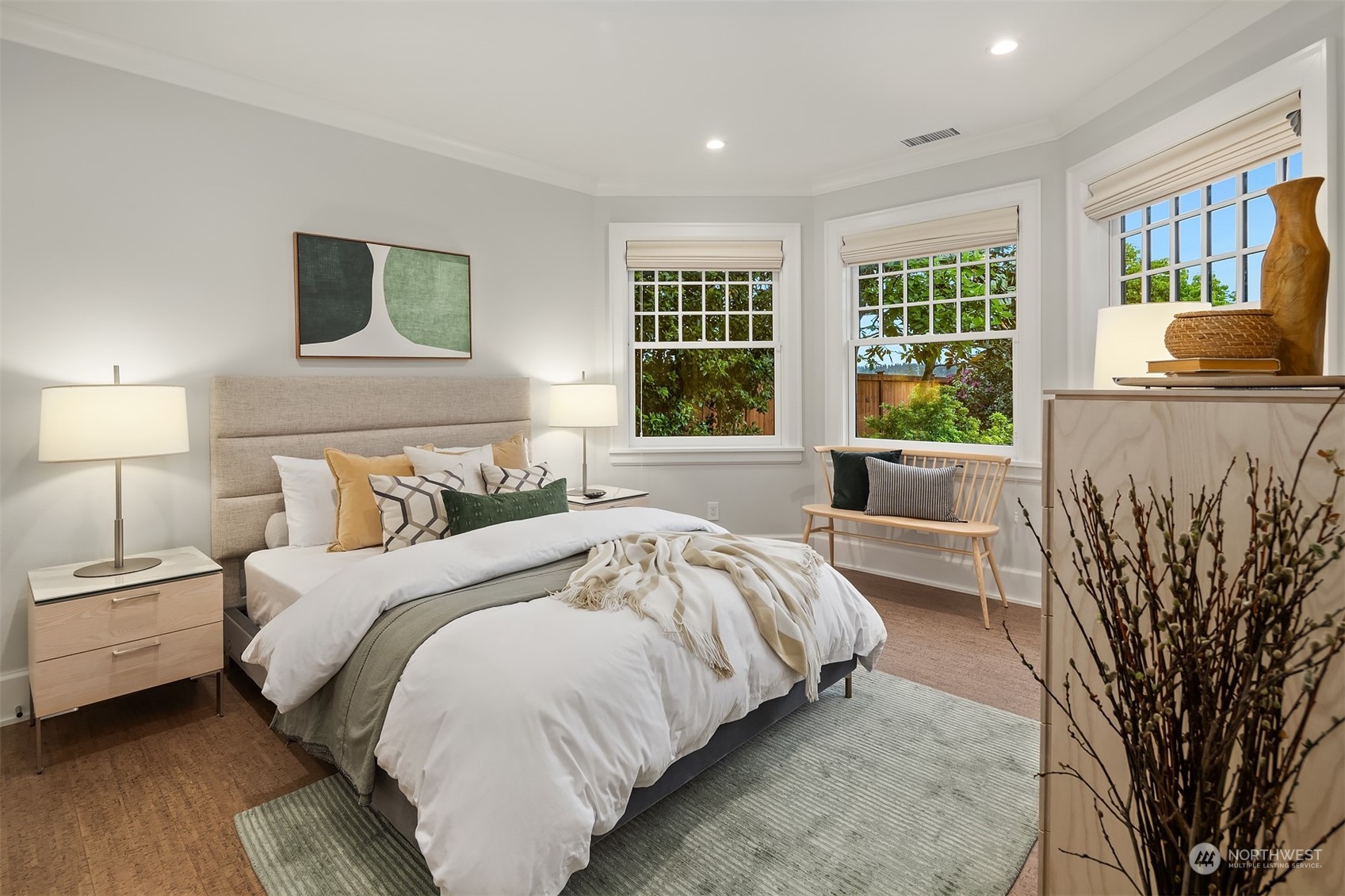 7270 North Mercer Way Mercer Island, WA 98040 - Photo 35 of 40 a spacious bedroom with a bed and a large window