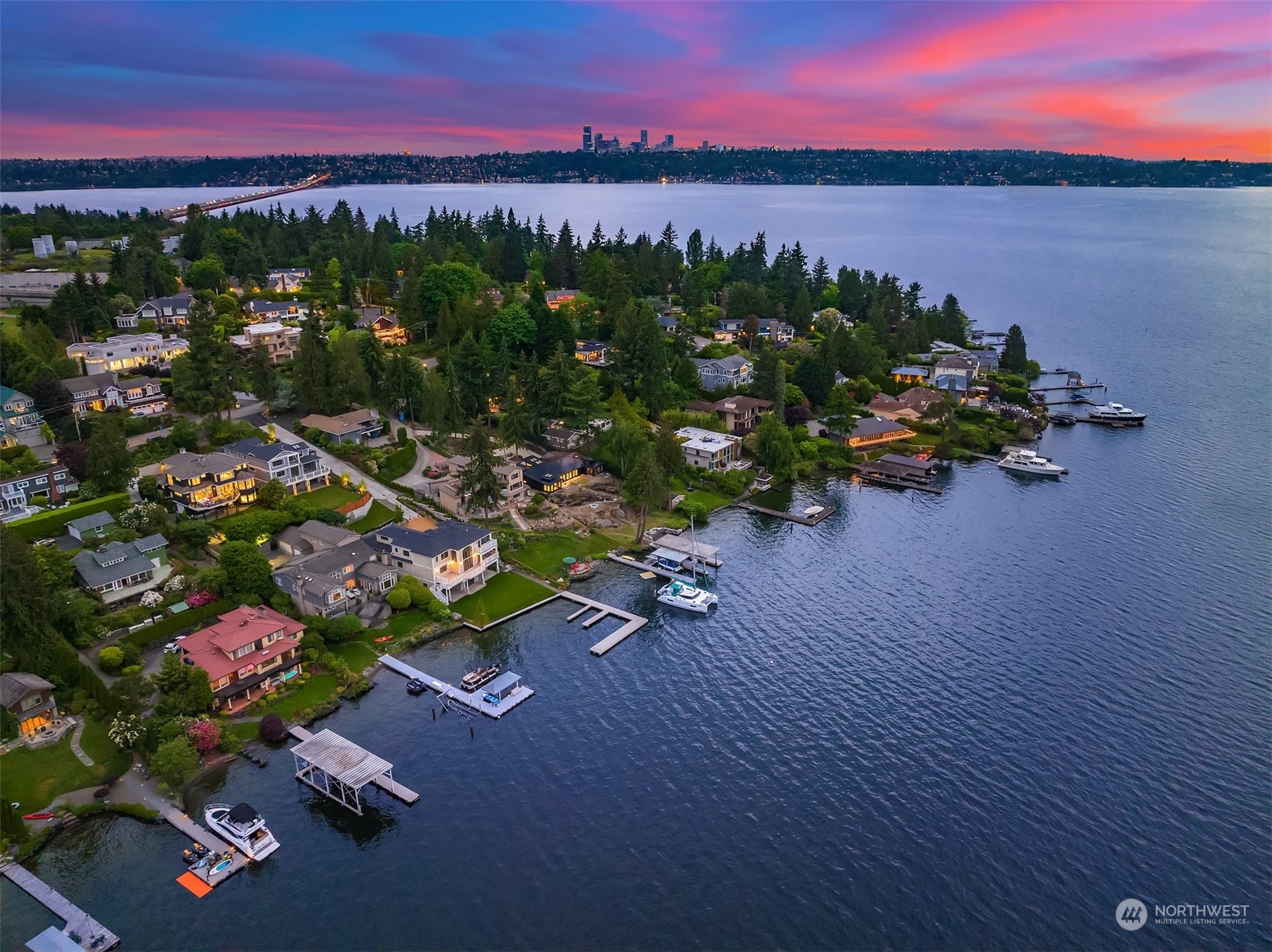 7270 North Mercer Way Mercer Island, WA 98040 - Photo 40 of 40 a view of a lake with a table and chairs