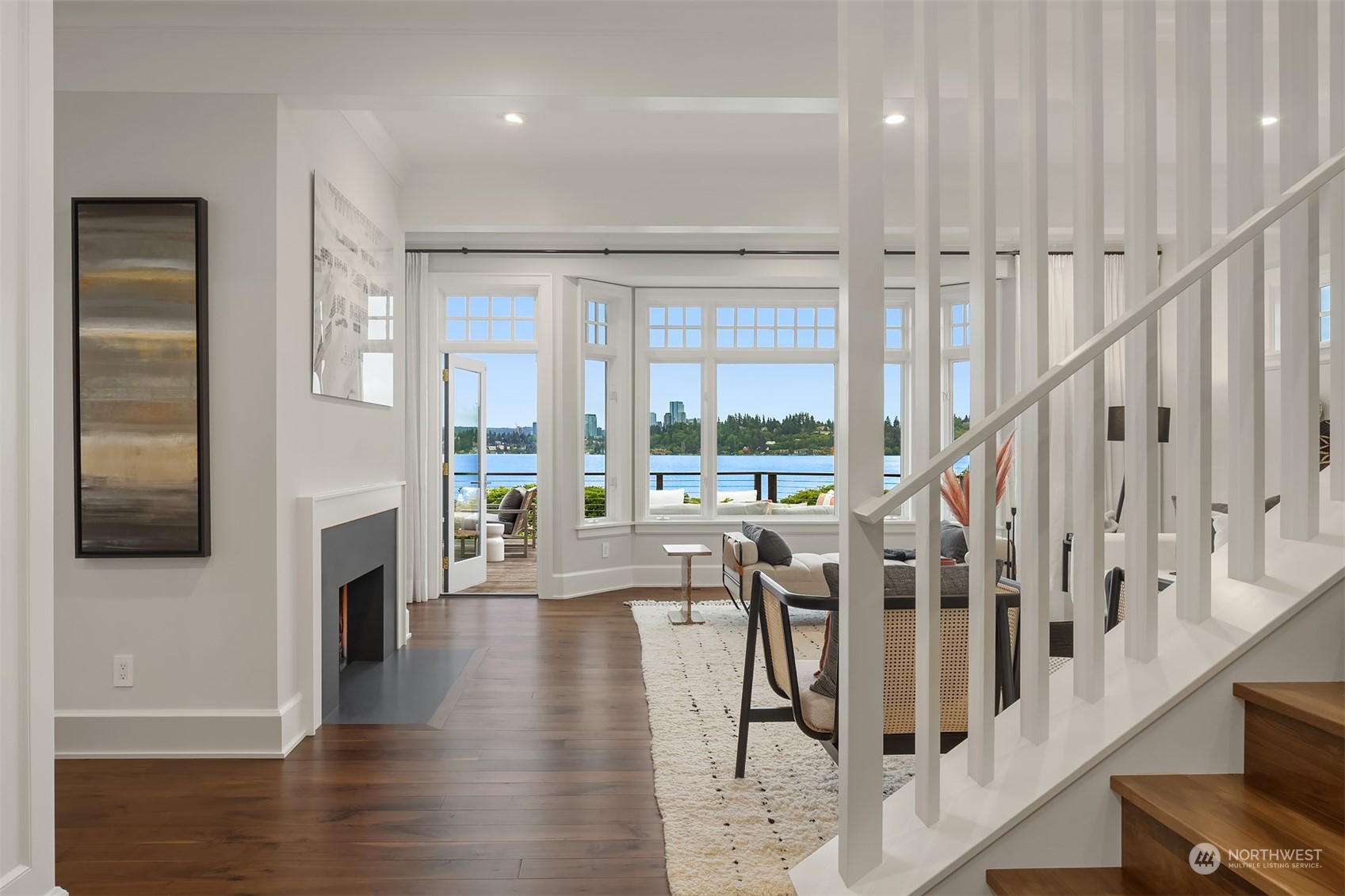 7270 North Mercer Way Mercer Island, WA 98040 - Photo 7 of 40 a living room with fireplace furniture and a flat screen tv