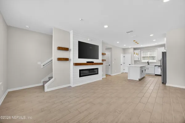 a bathroom with a double vanity sink mirror and double
