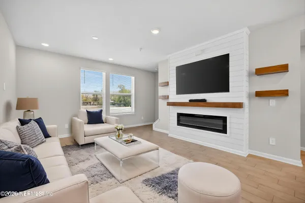 a front view of residential houses with street