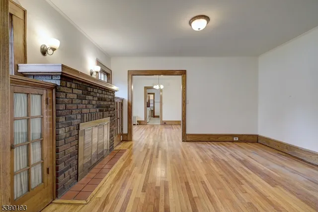 a view of a livingroom with wooden floor
