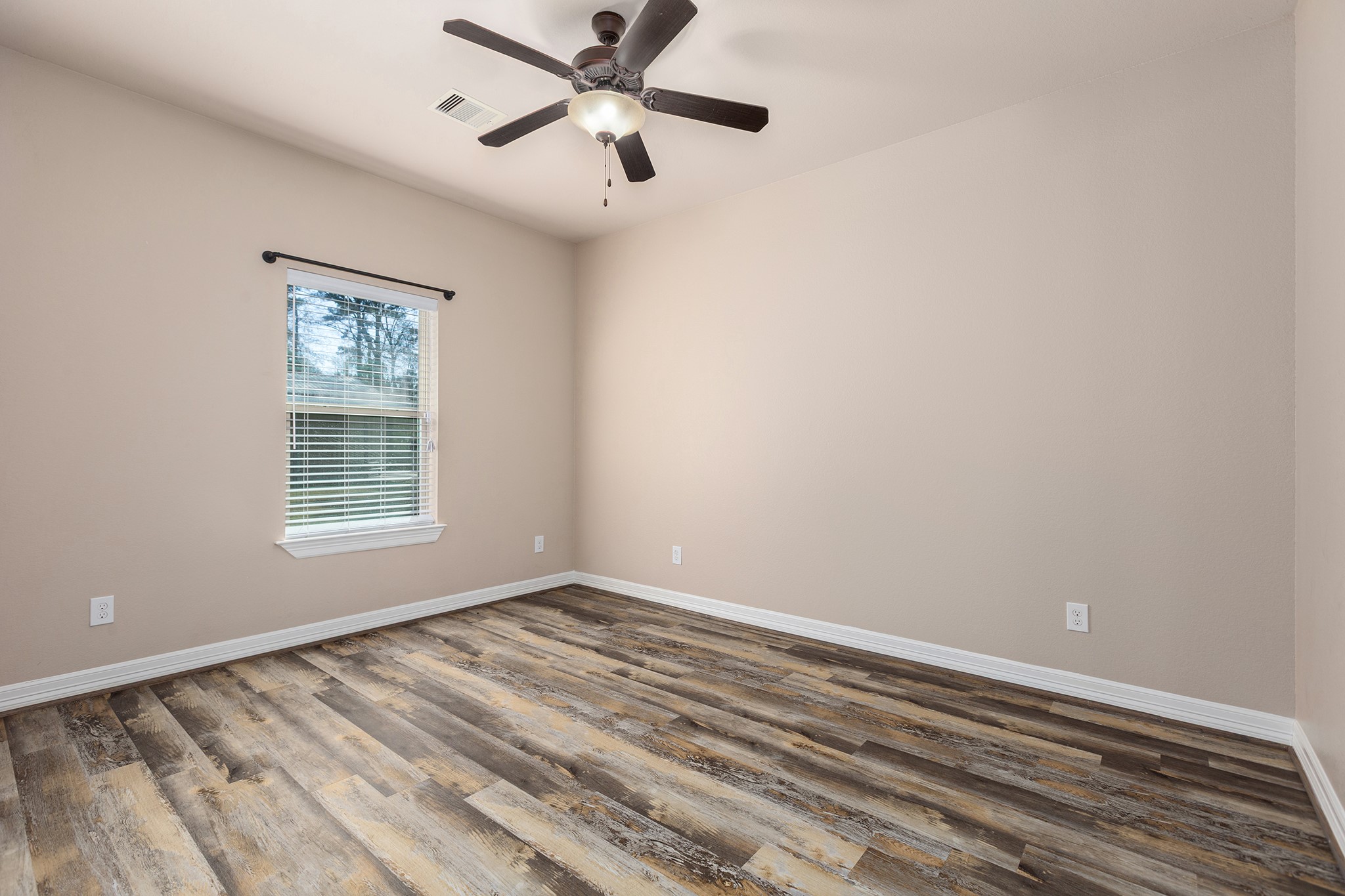 27688 Rio Blanco Drive Splendora, TX 77372 - Photo 30 of 50 a view of room with window and ceiling fan