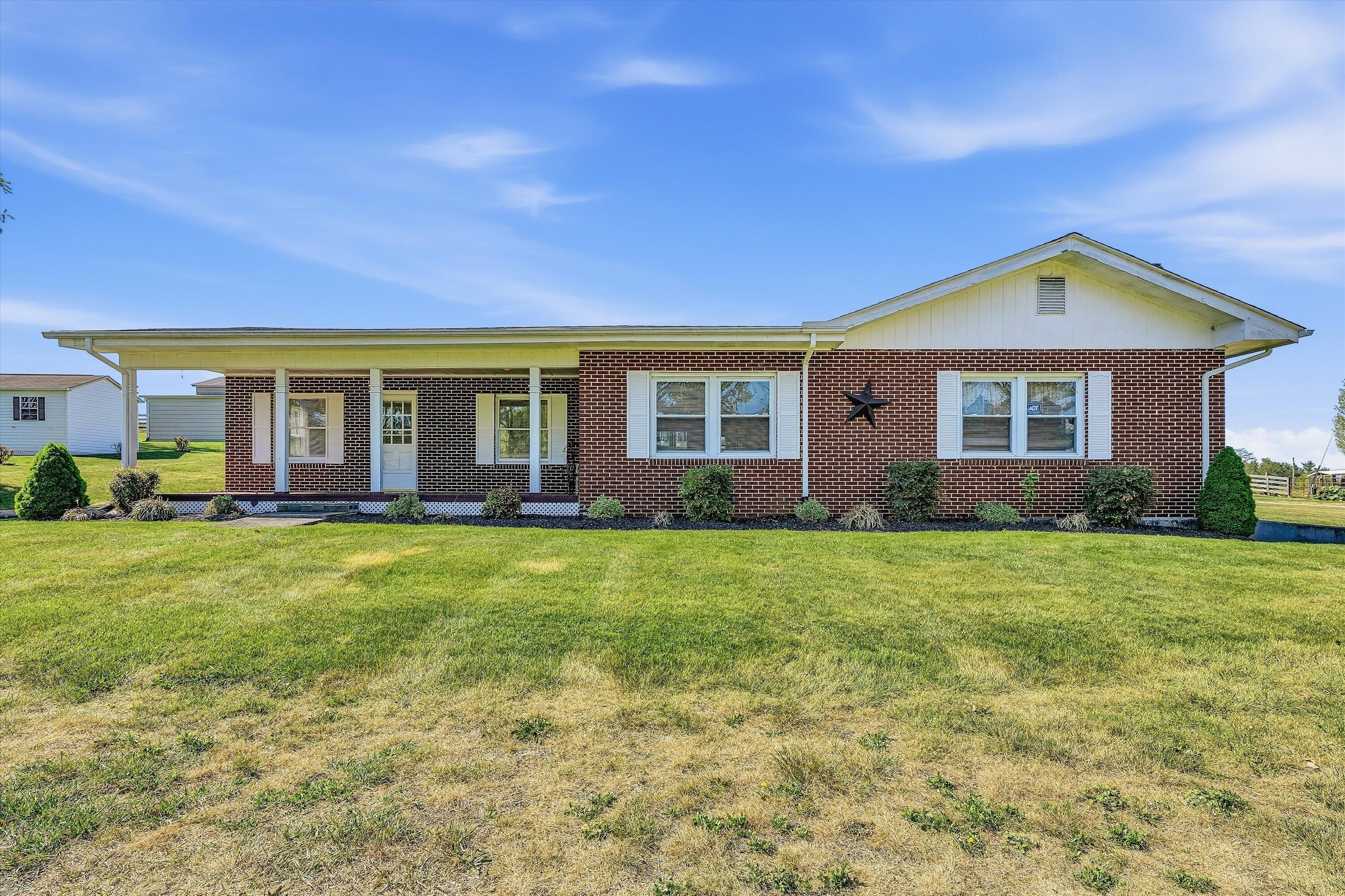 3673 Mt Zion Road Blacksburg, VA 24060 - Photo 2 of 51 a view of a house with backyard and garden