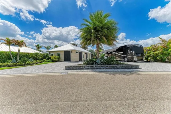 a view of a house with a street