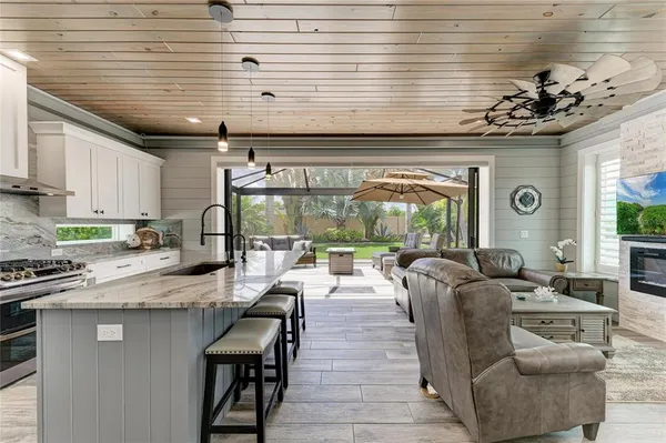 a very nice looking kitchen with a large window
