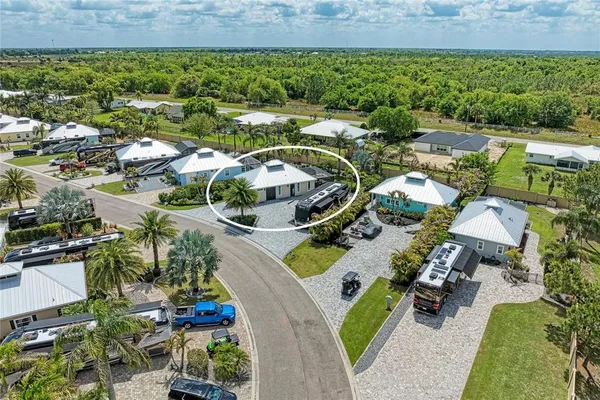 an aerial view of a house with outdoor space