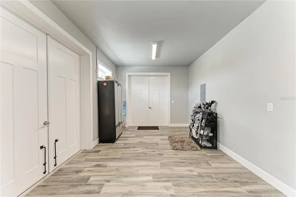 a view of a livingroom with wooden floor