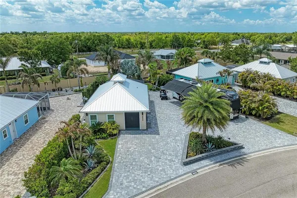 an aerial view of a house having yard