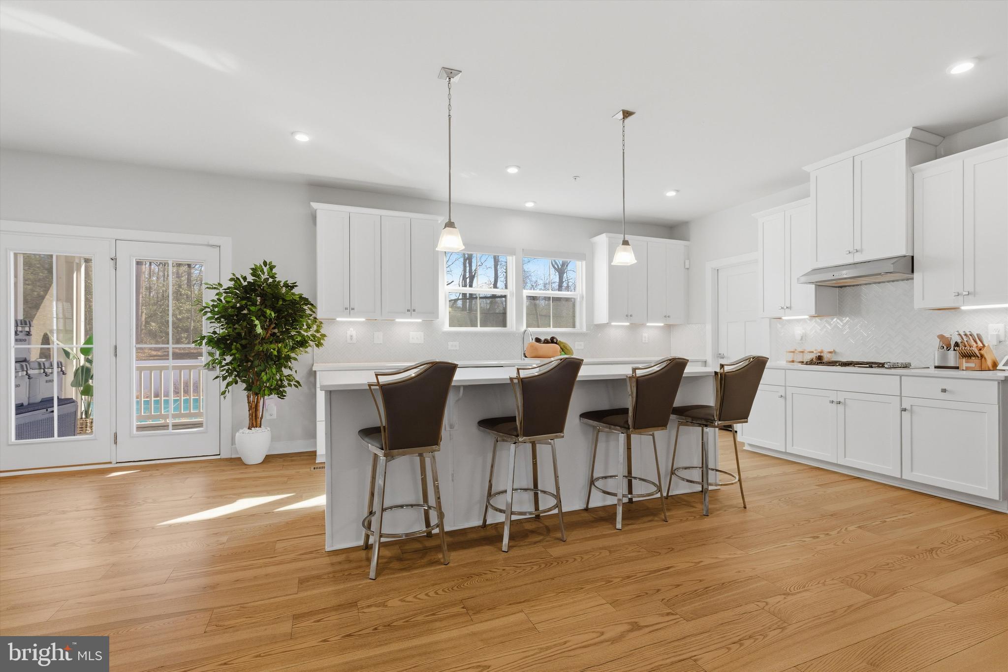 1321 Upper Patuxent Ridge Road Odenton, MD 21113 - Photo 11 of 82 a view of a dining room with furniture and wooden floor