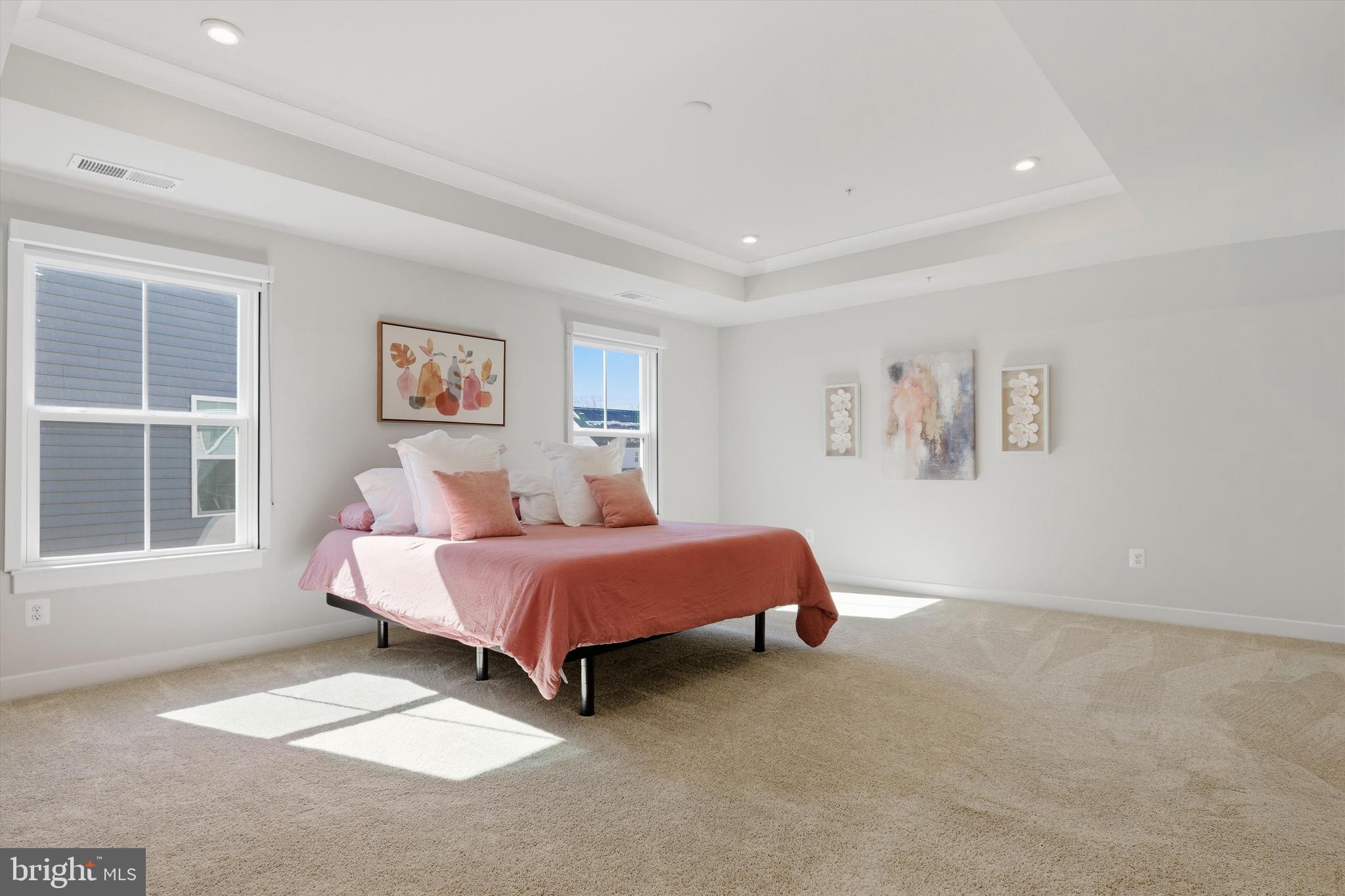 1321 Upper Patuxent Ridge Road Odenton, MD 21113 - Photo 20 of 82 a spacious bedroom with a bed and a large window