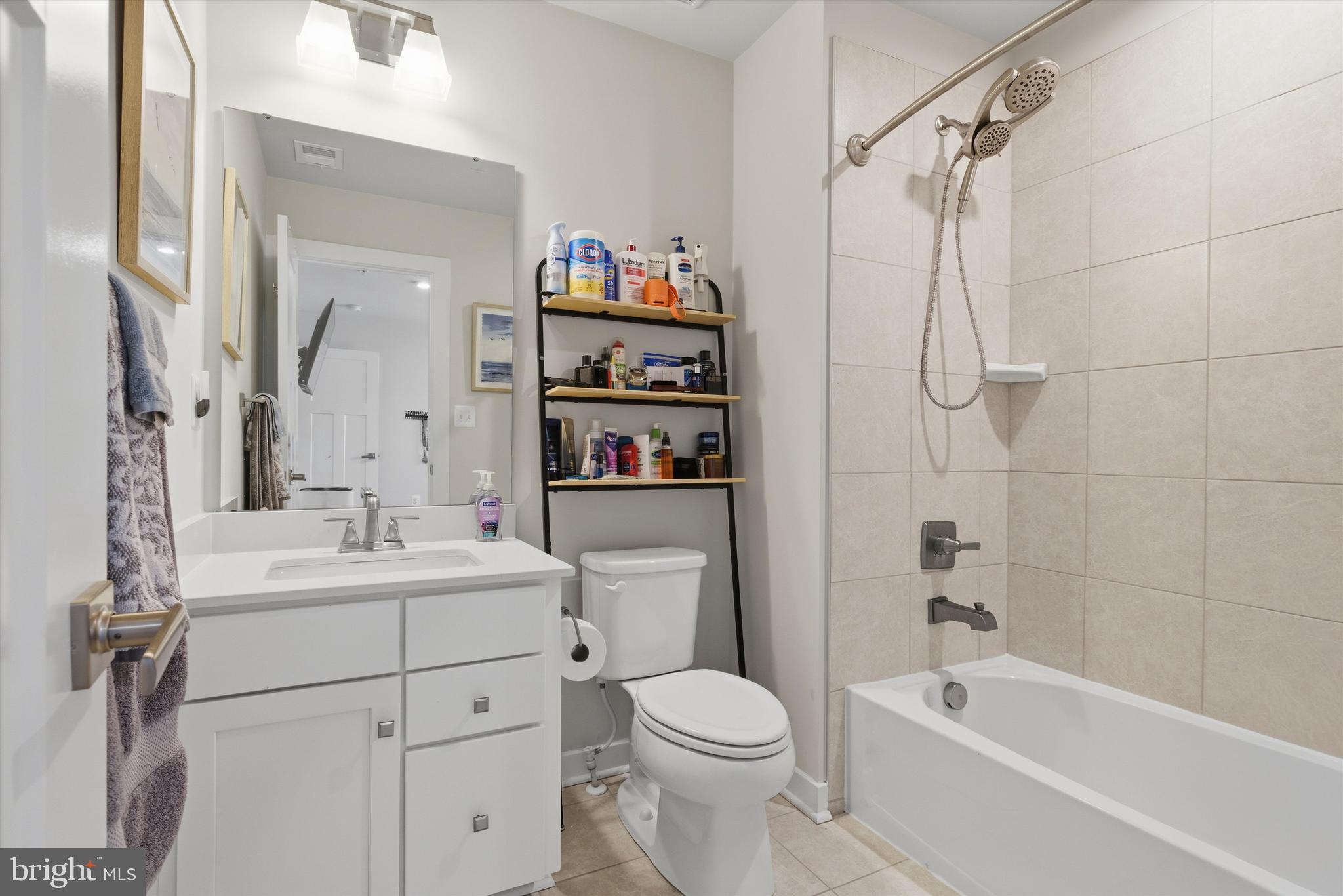 1321 Upper Patuxent Ridge Road Odenton, MD 21113 - Photo 26 of 82 a bathroom with a sink a toilet and a mirror