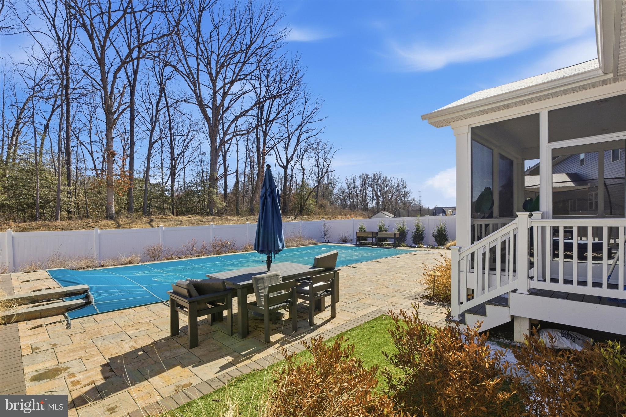 1321 Upper Patuxent Ridge Road Odenton, MD 21113 - Photo 40 of 82 a view of a patio with chairs and wooden fence