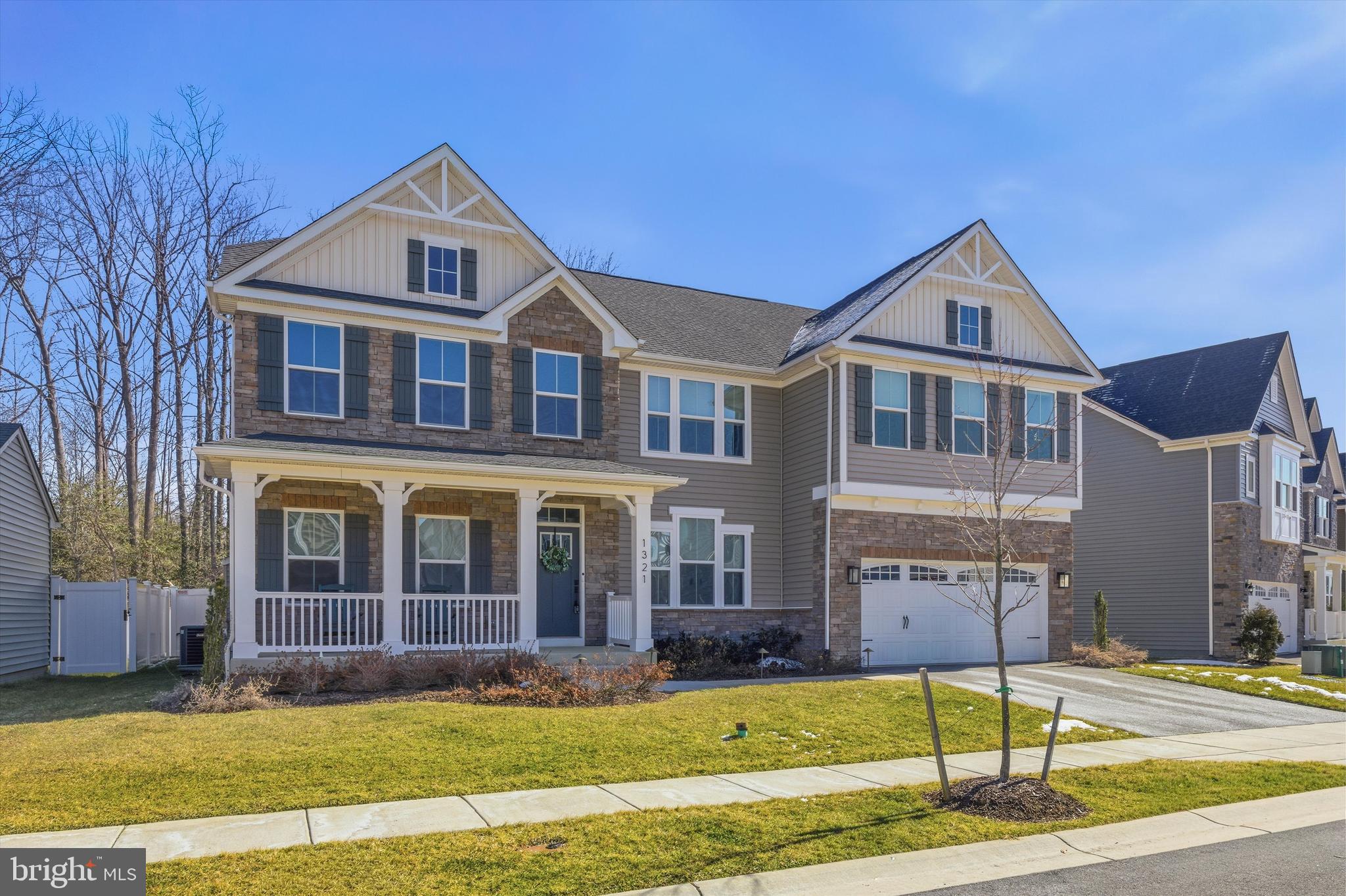 1321 Upper Patuxent Ridge Road Odenton, MD 21113 - Photo 50 of 82 a front view of a house with a yard