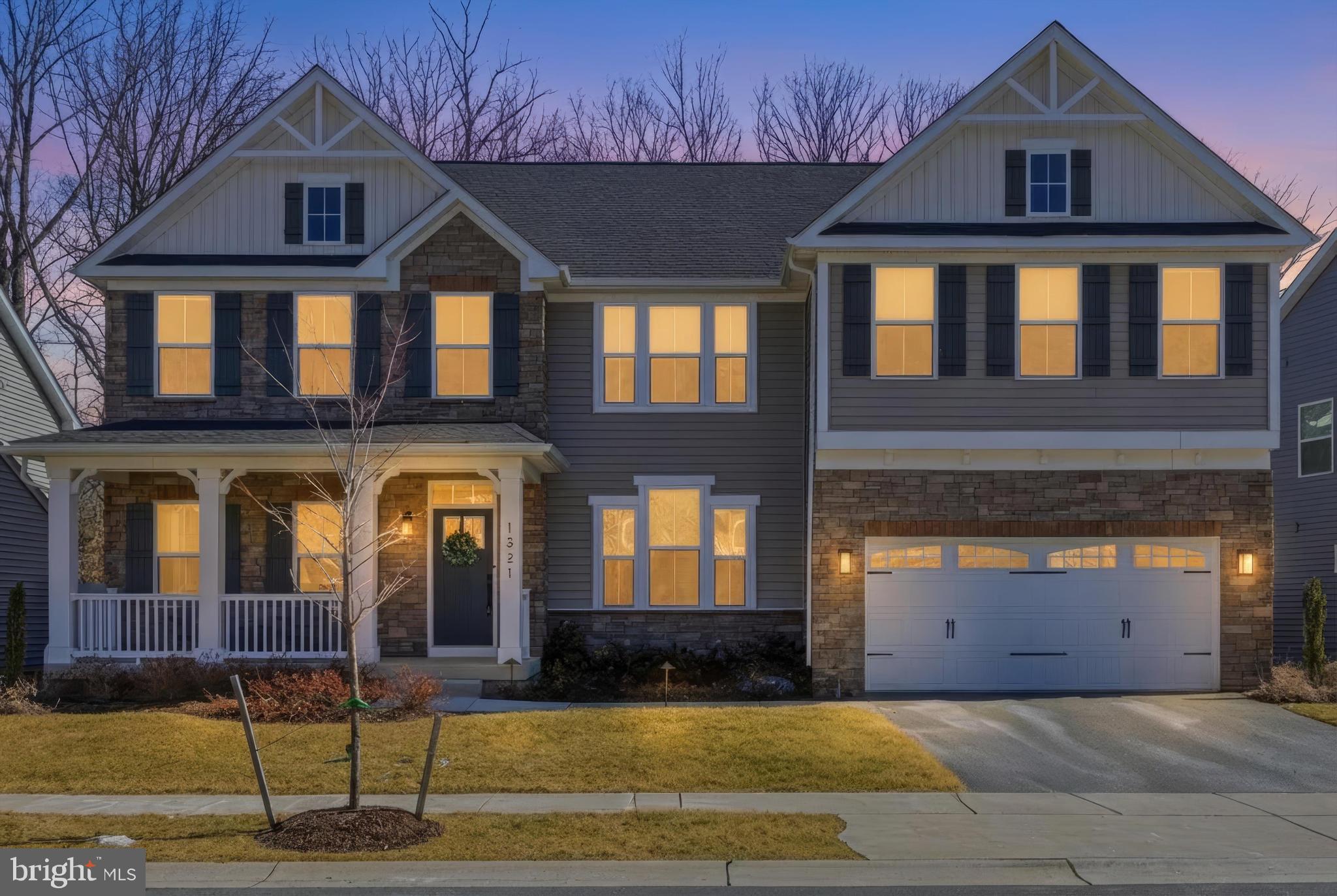 1321 Upper Patuxent Ridge Road Odenton, MD 21113 - Photo 51 of 82 a front view of a house with a yard