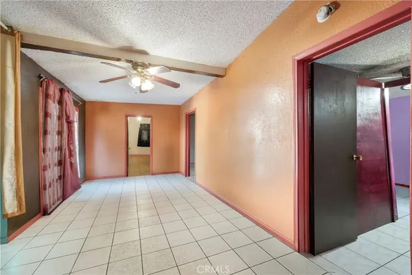 a view of a hallway with closet