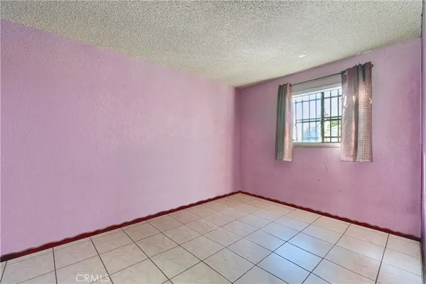 a view of an empty room with window