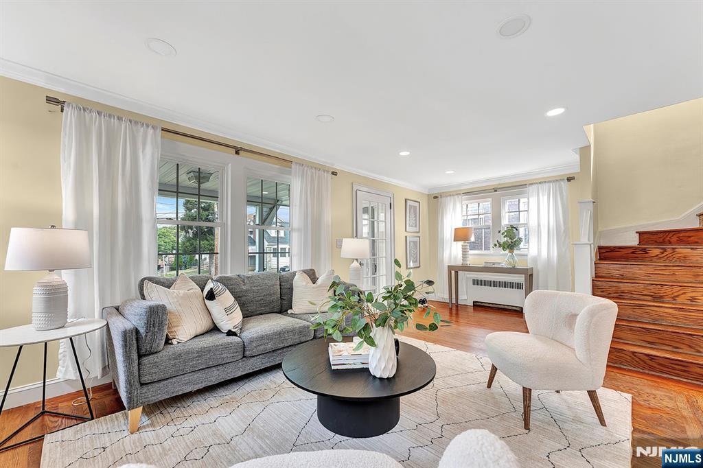 57 Berkeley Avenue Belleville, NJ 07109 - Photo 5 of 36 a living room with furniture and a large window
