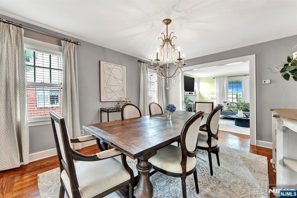 57 Berkeley Avenue Belleville, NJ 07109 - Photo 8 of 36 a view of a dining room with furniture window and wooden floor