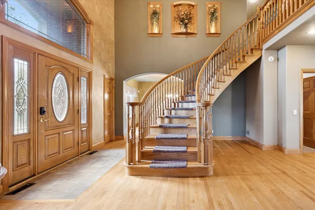 a view of entryway with wooden floor