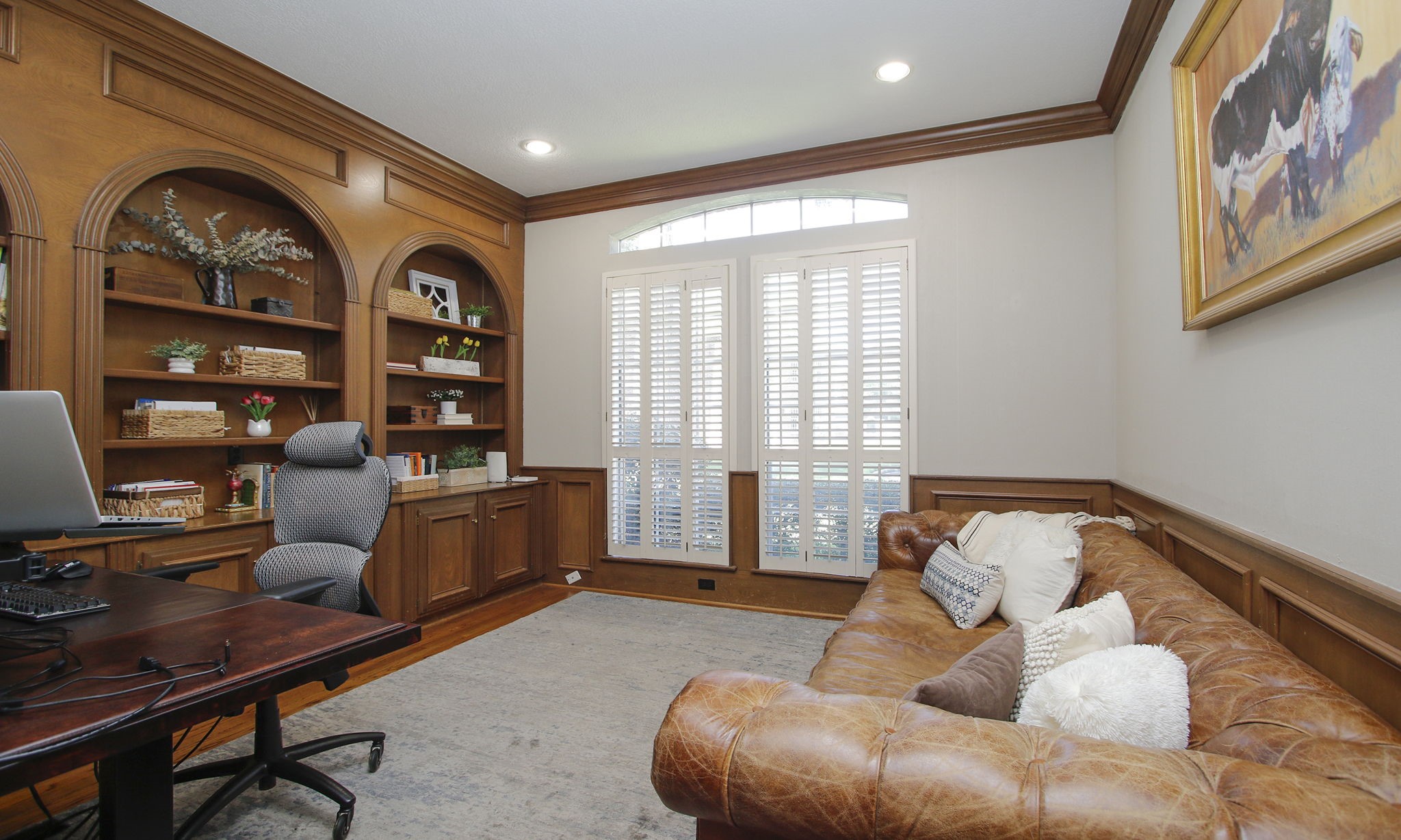 15923 Harwick Drive Spring, TX 77379 - Photo 11 of 50 The home office is just off the foyer and features custom built in shelves and cabinetry.