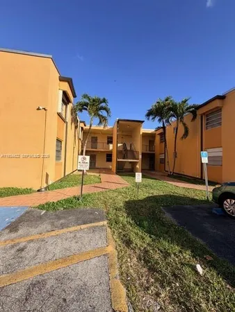 a view of a back yard of the house