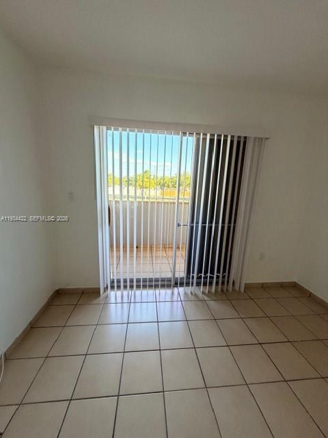 8990 Southwest 24th Street, Unit 215 Miami, FL 33165 - Photo 12 of 22 a view of an empty room with a window