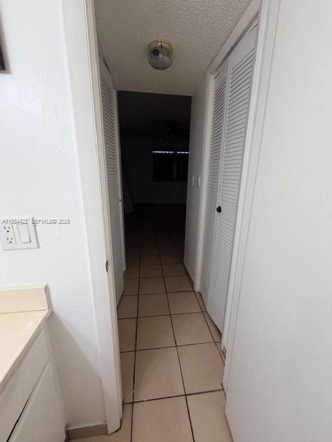 8990 Southwest 24th Street, Unit 215 Miami, FL 33165 - Photo 13 of 23 a view of an empty walk in closet