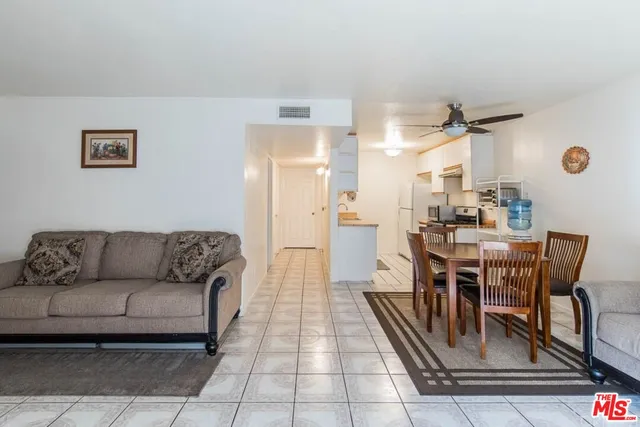 a dining room with furniture and a table