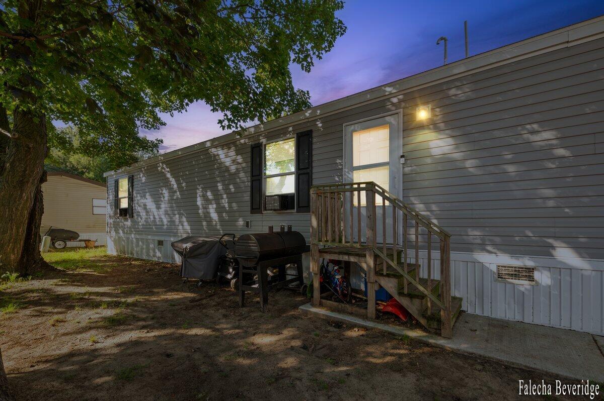 1281 East Pontaluna Road, Unit 101 Spring Lake, MI 49456 - Photo 18 of 18 Twilight