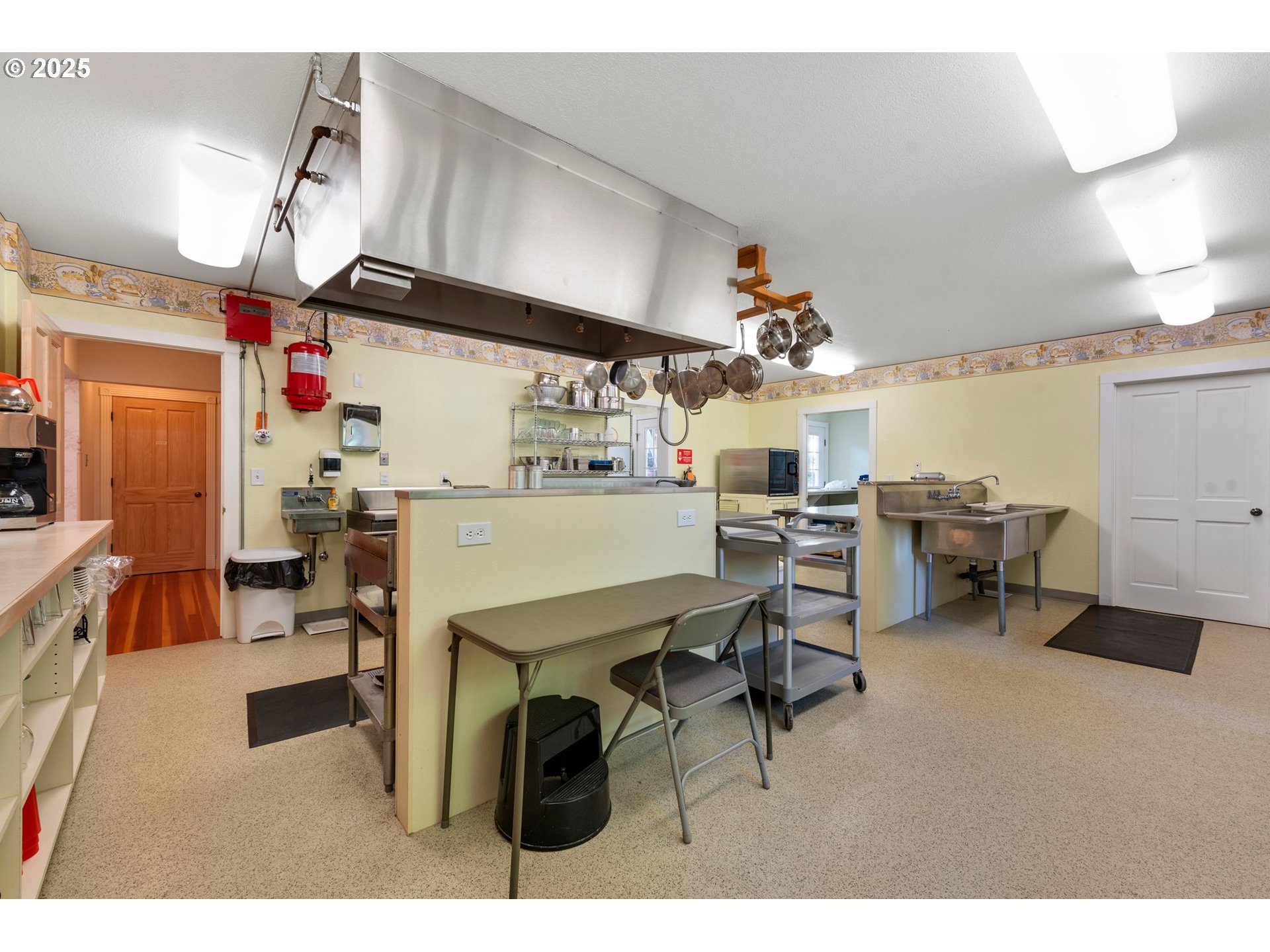 48212 Clear Creek Road Halfway, OR 97834 - Photo 13 of 47 a room with lots of wooden furniture and a window