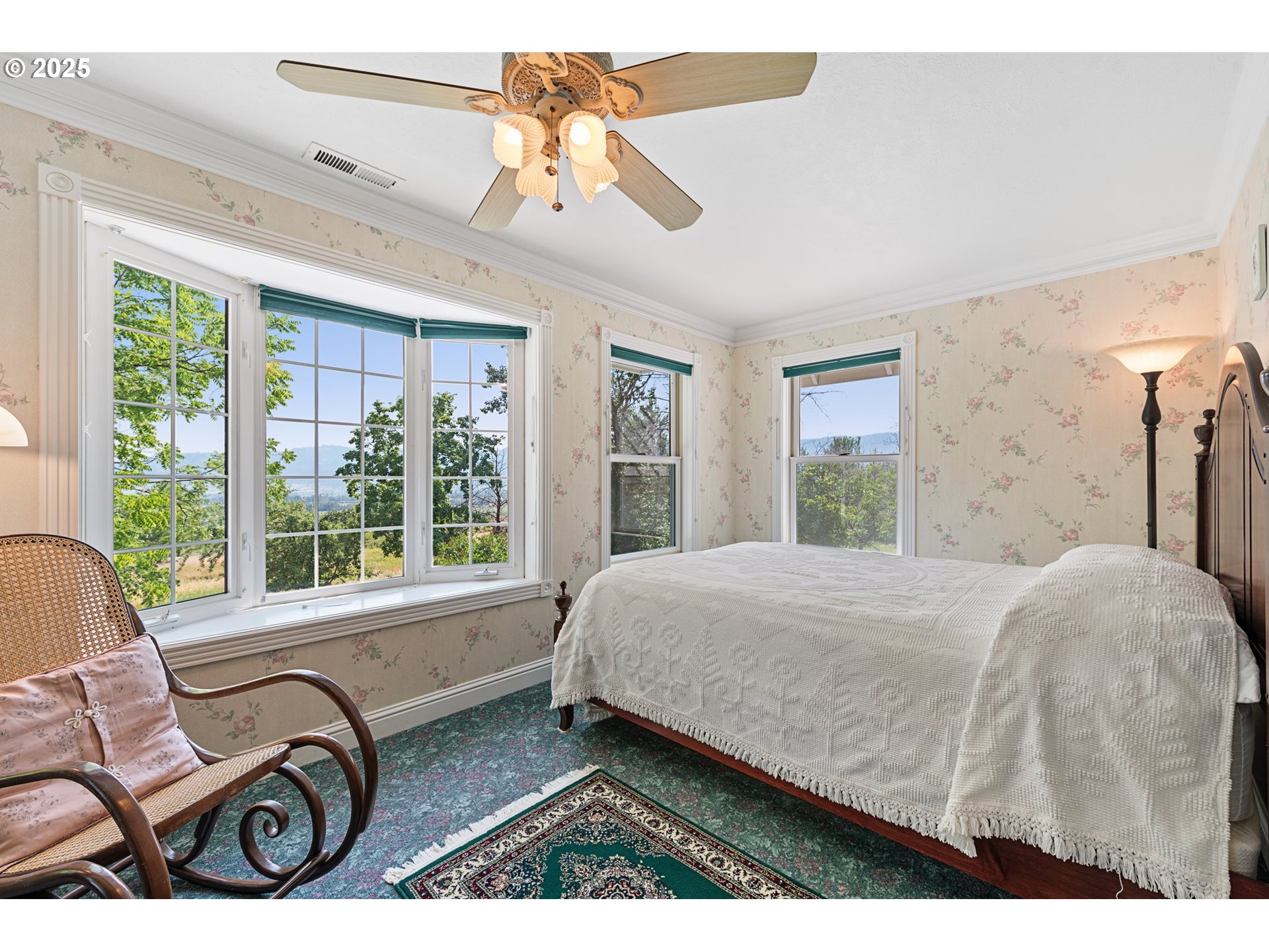 48212 Clear Creek Road Halfway, OR 97834 - Photo 17 of 47 a bedroom with a bed next to a large window with the outer view