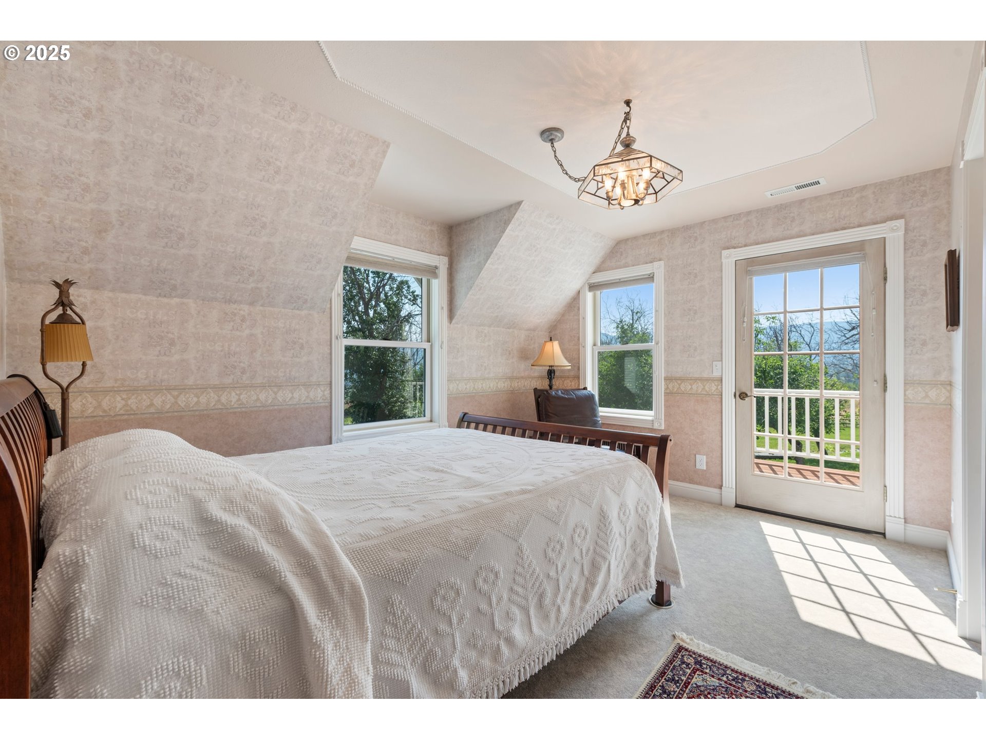 48212 Clear Creek Road Halfway, OR 97834 - Photo 20 of 47 a bedroom with a large bed and a window