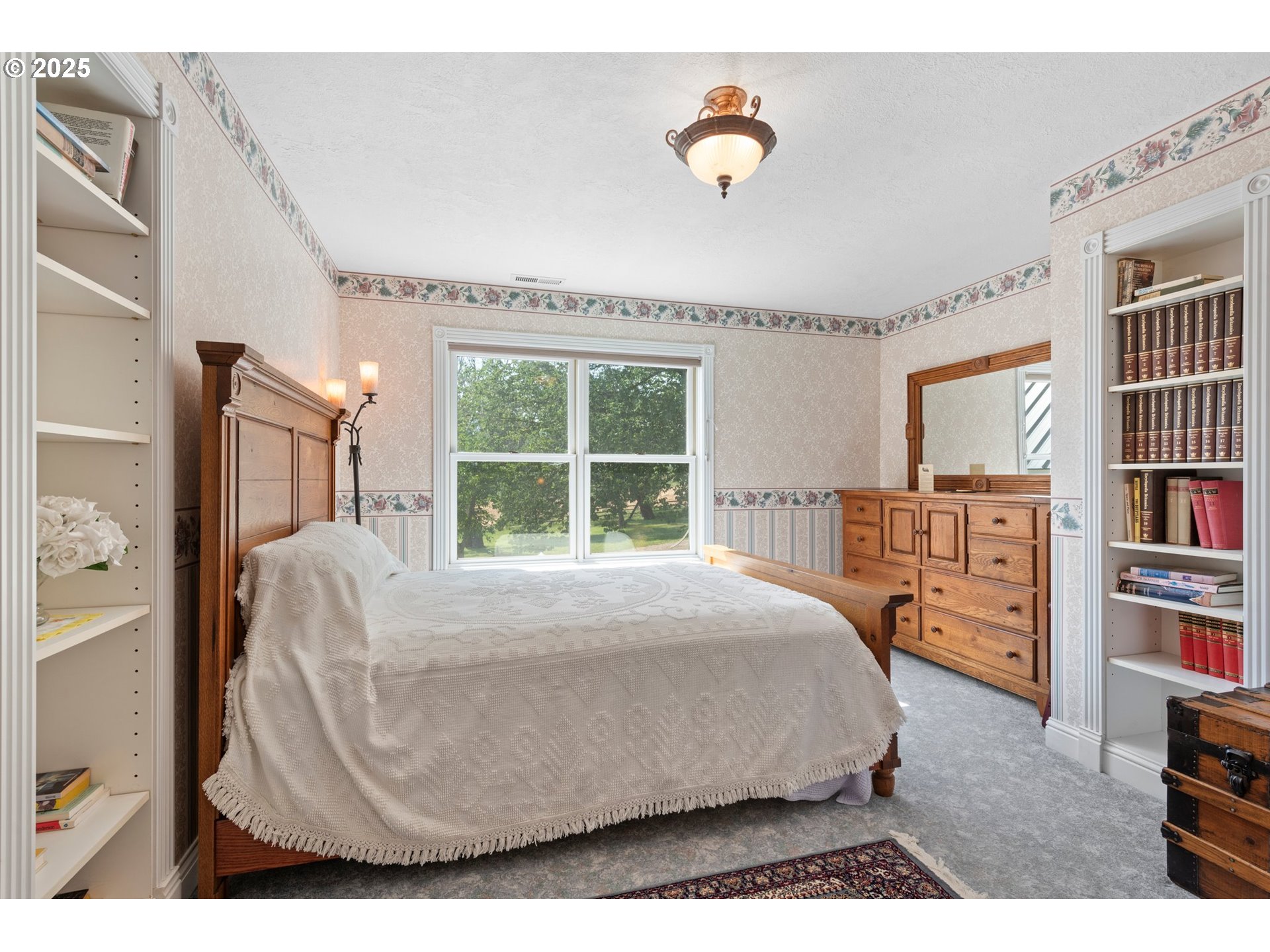 48212 Clear Creek Road Halfway, OR 97834 - Photo 22 of 47 a bed sitting in a bedroom next to a window