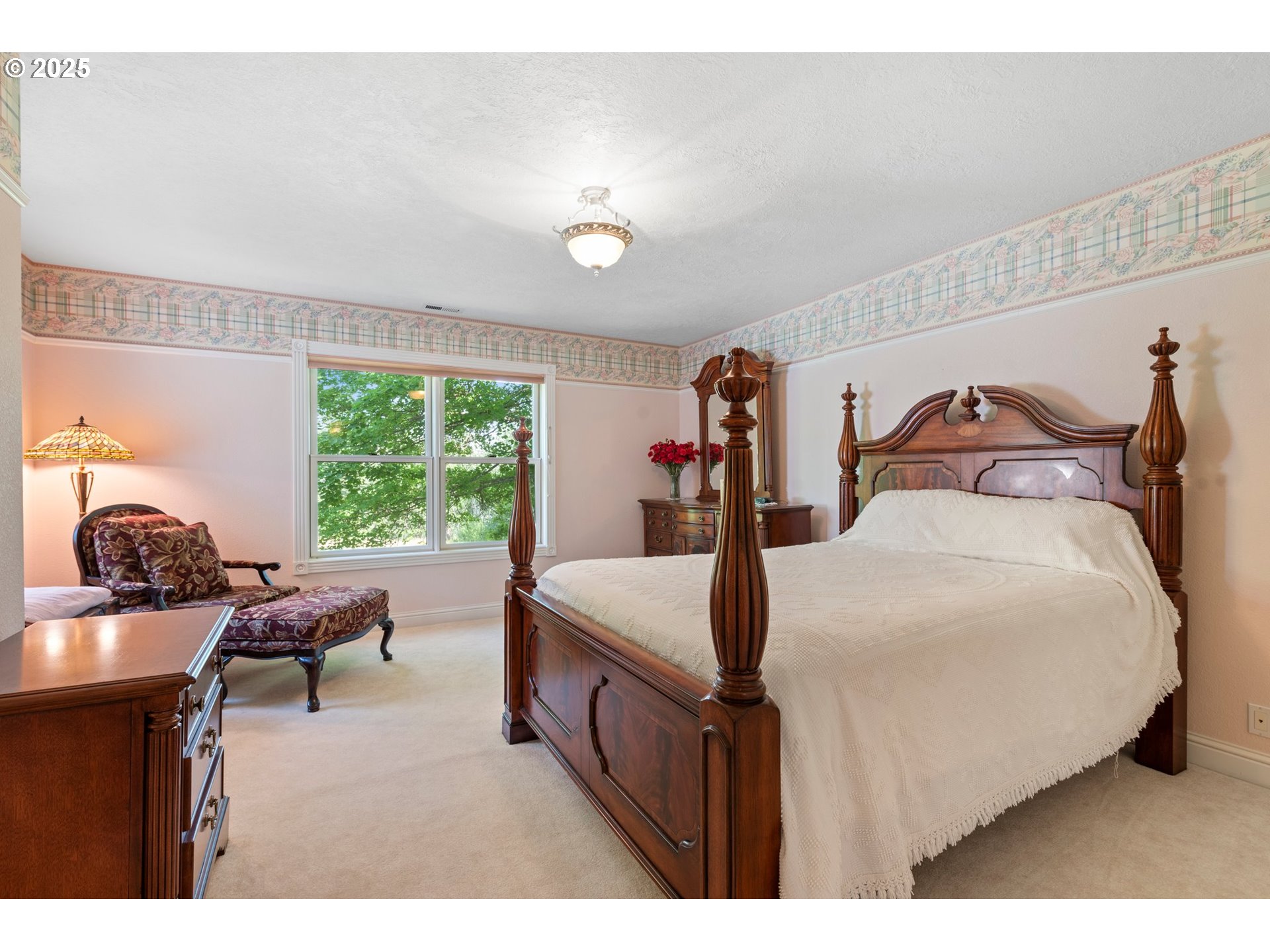 48212 Clear Creek Road Halfway, OR 97834 - Photo 23 of 47 a bed room with a bed and a chair