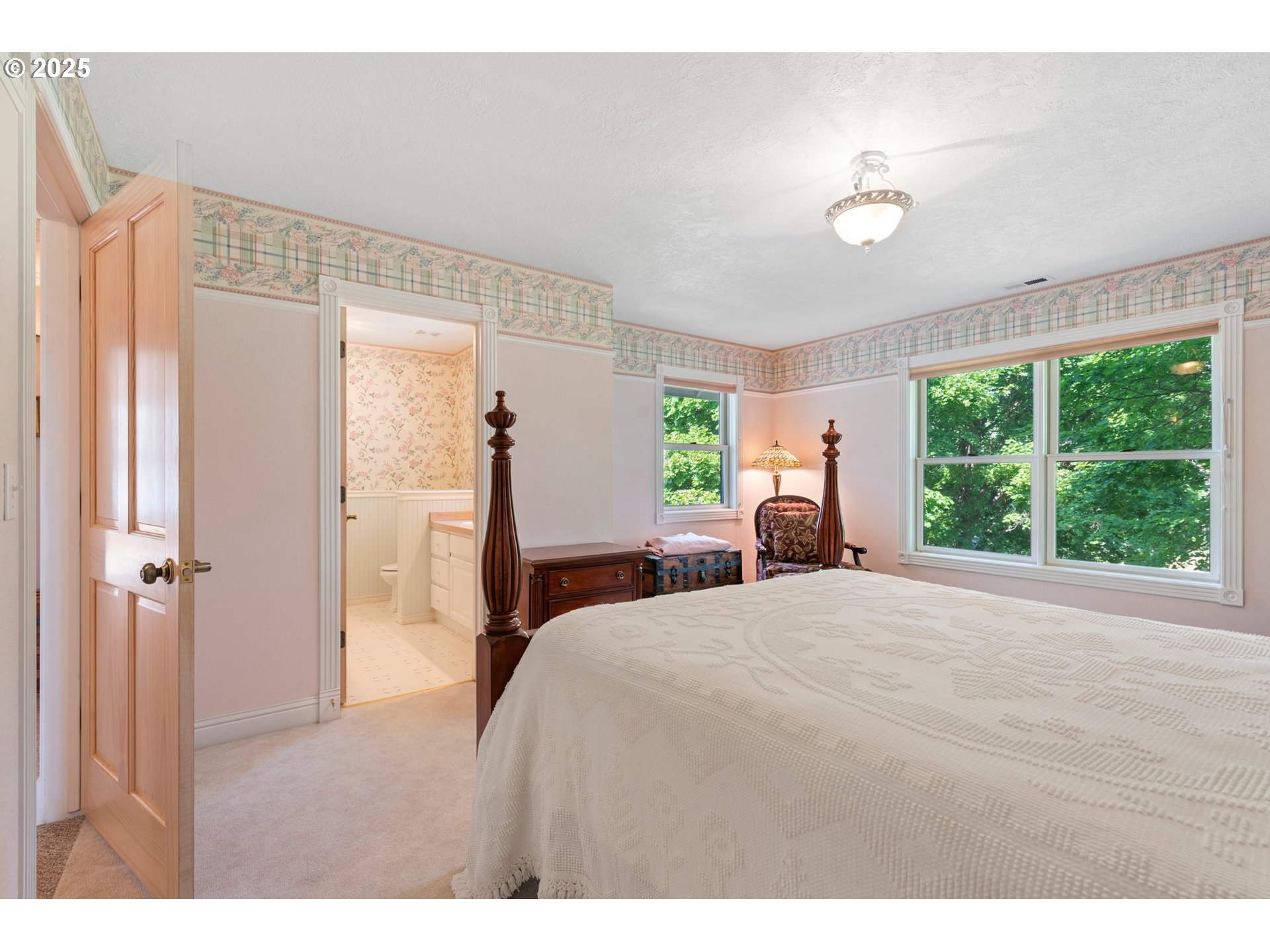 48212 Clear Creek Road Halfway, OR 97834 - Photo 24 of 47 a bedroom with a bed closet and a window