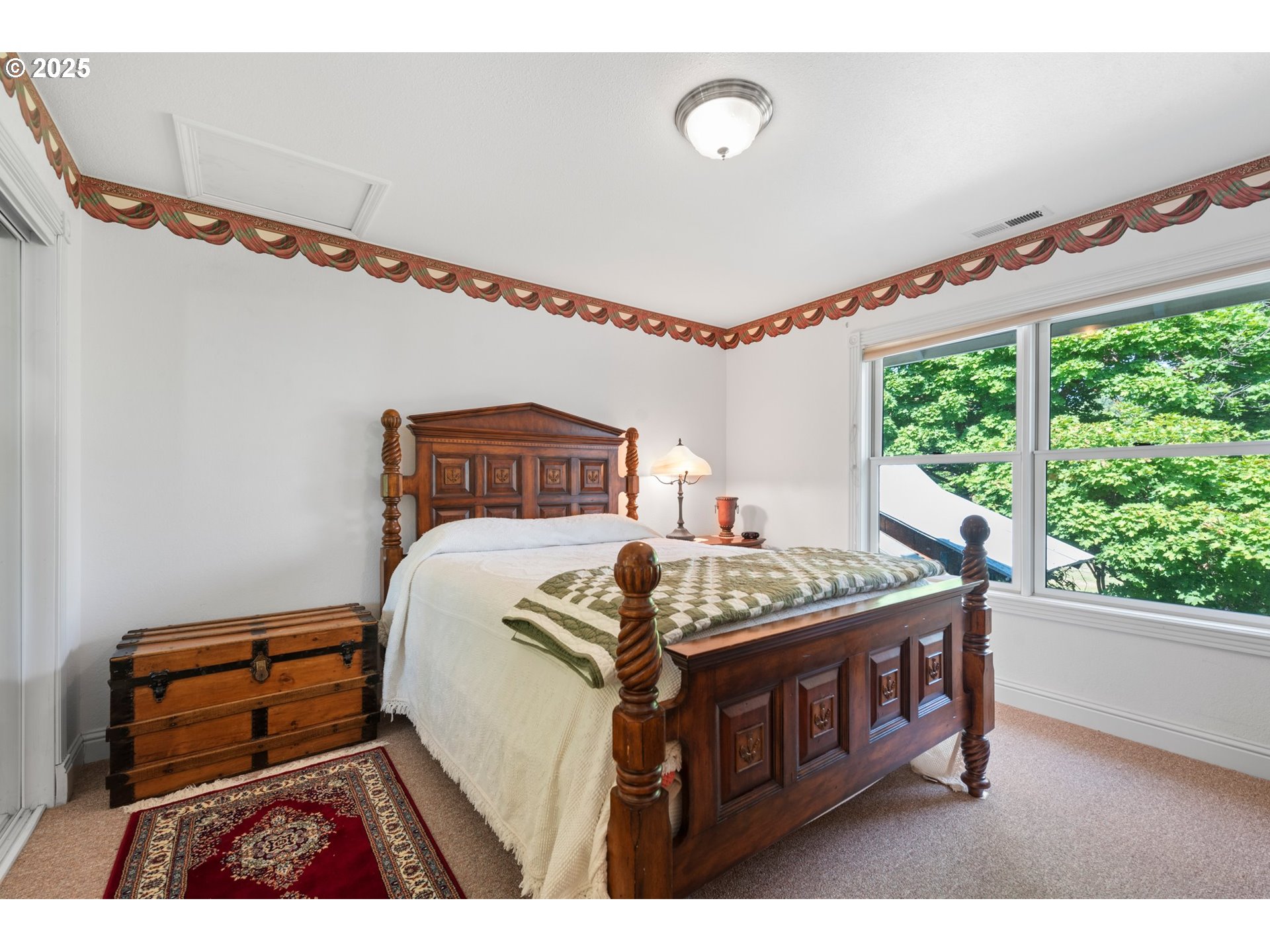 48212 Clear Creek Road Halfway, OR 97834 - Photo 26 of 47 a bedroom with furniture and a window