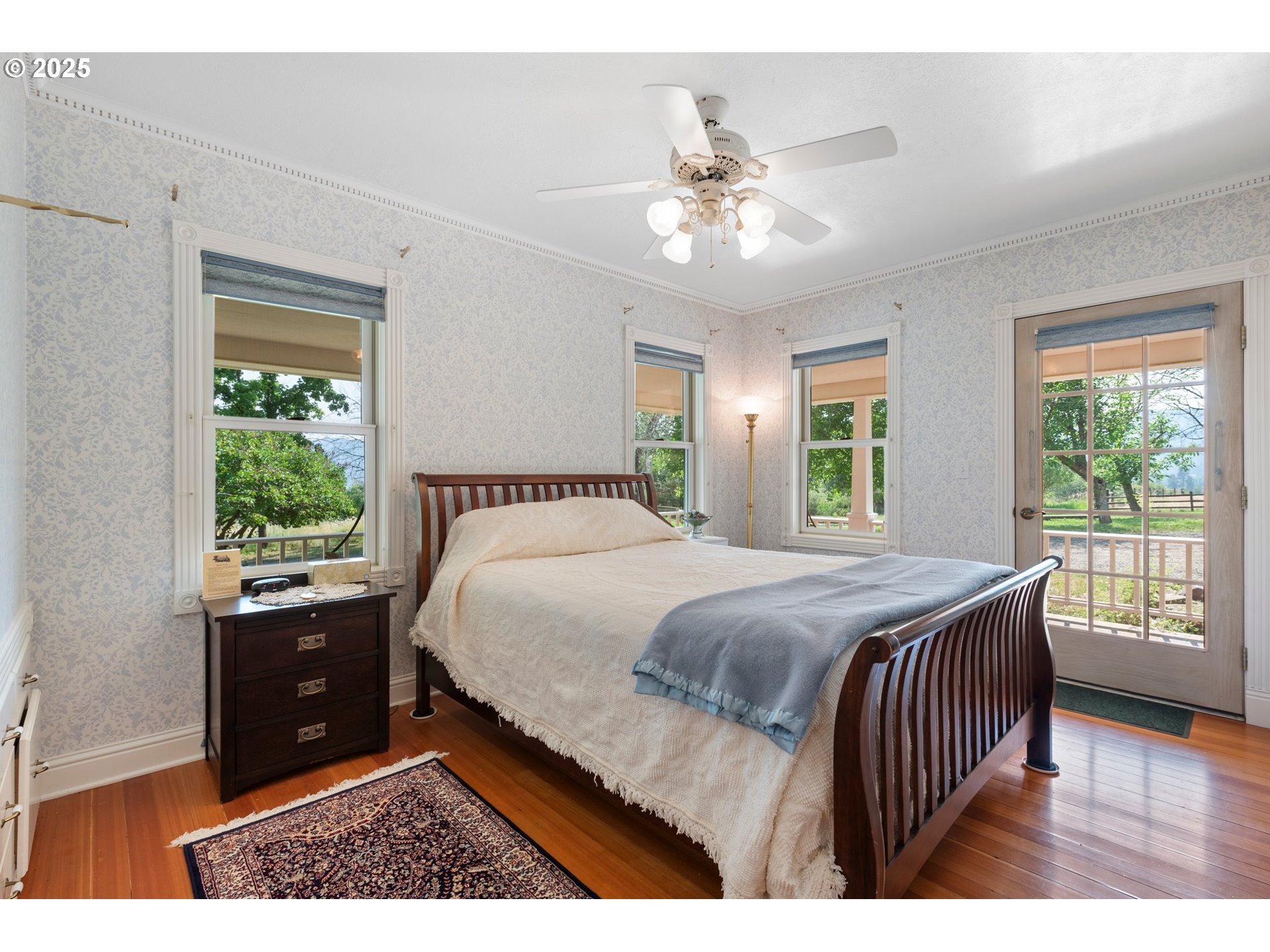 48212 Clear Creek Road Halfway, OR 97834 - Photo 28 of 47 a bedroom with a bed and a window