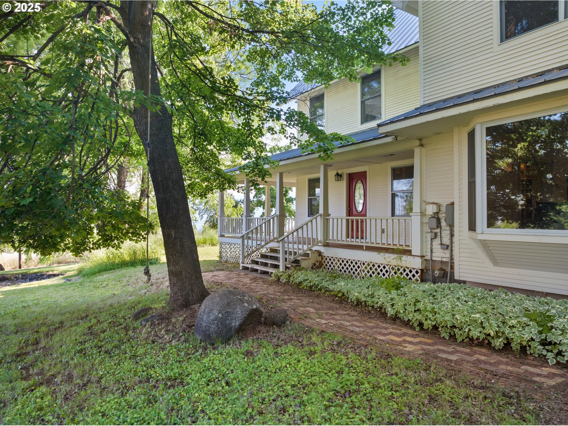 48212 Clear Creek Road Halfway, OR 97834 - Photo 36 of 47 a view of a house with backyard and a tree