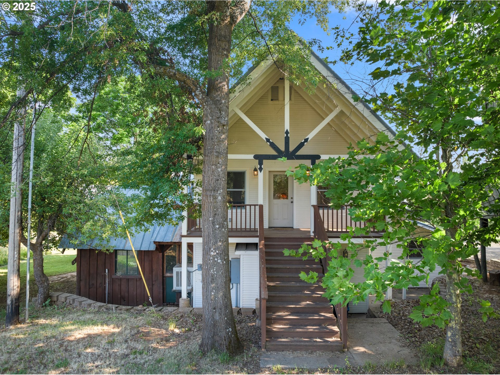 48212 Clear Creek Road Halfway, OR 97834 - Photo 37 of 47 a table and chair under an umbrella