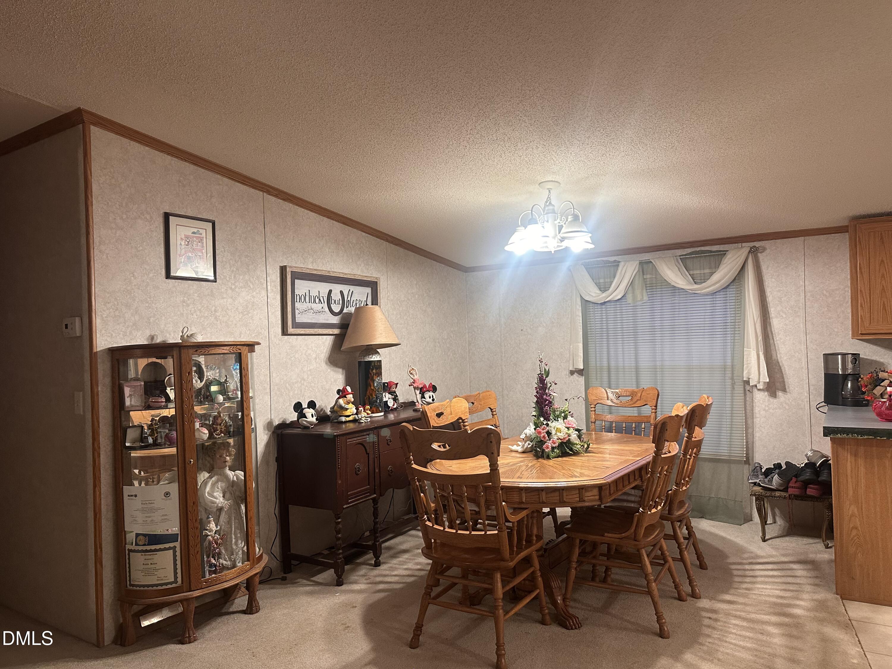 10087 Highway 39 Middlesex, NC 27557 - Photo 13 of 17 a view of a dining room with furniture
