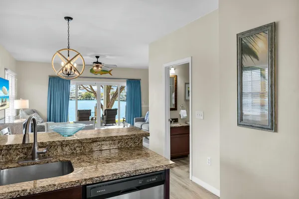 a view of a lake with sitting area