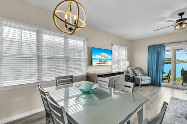 a kitchen with stainless steel appliances granite countertop sink stove and refrigerator