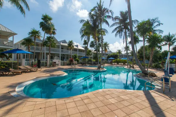 a view of a city with lawn chairs