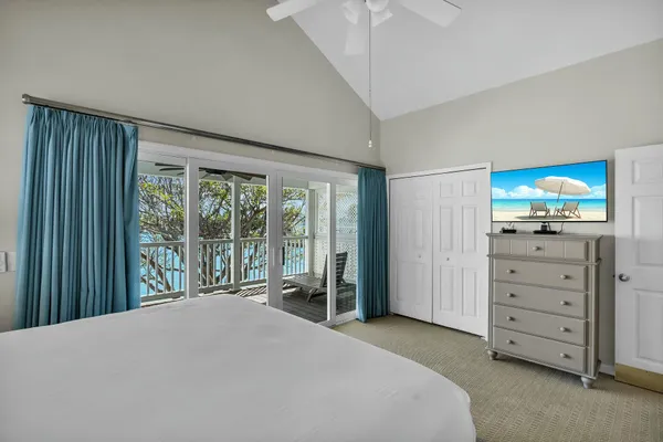 a bathroom with a shower and a sink